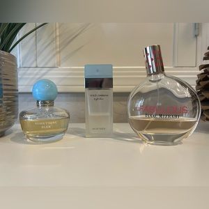 Bundle of 3 fragrances: Dolce & Gabbana, Oscar de la Renta, and Isaac Mizrahi.